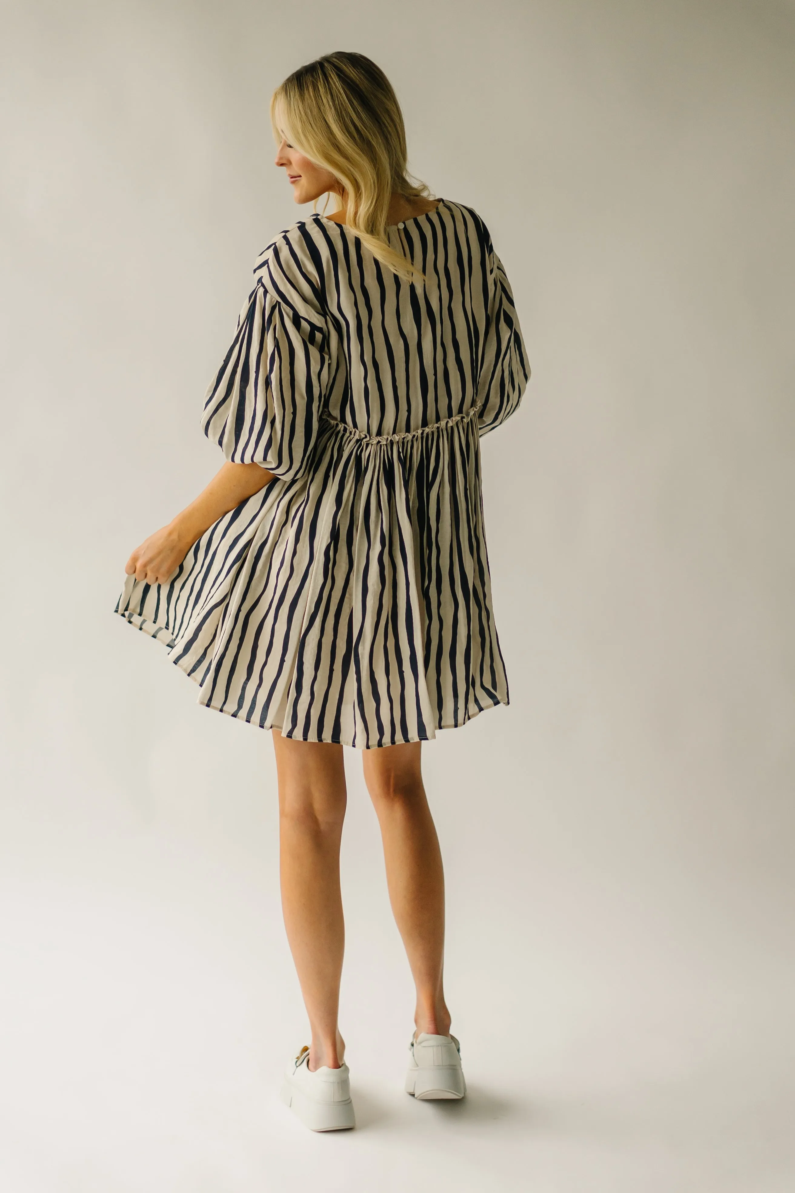 The Pampa Bubble Sleeve Babydoll Dress in Navy Stripe