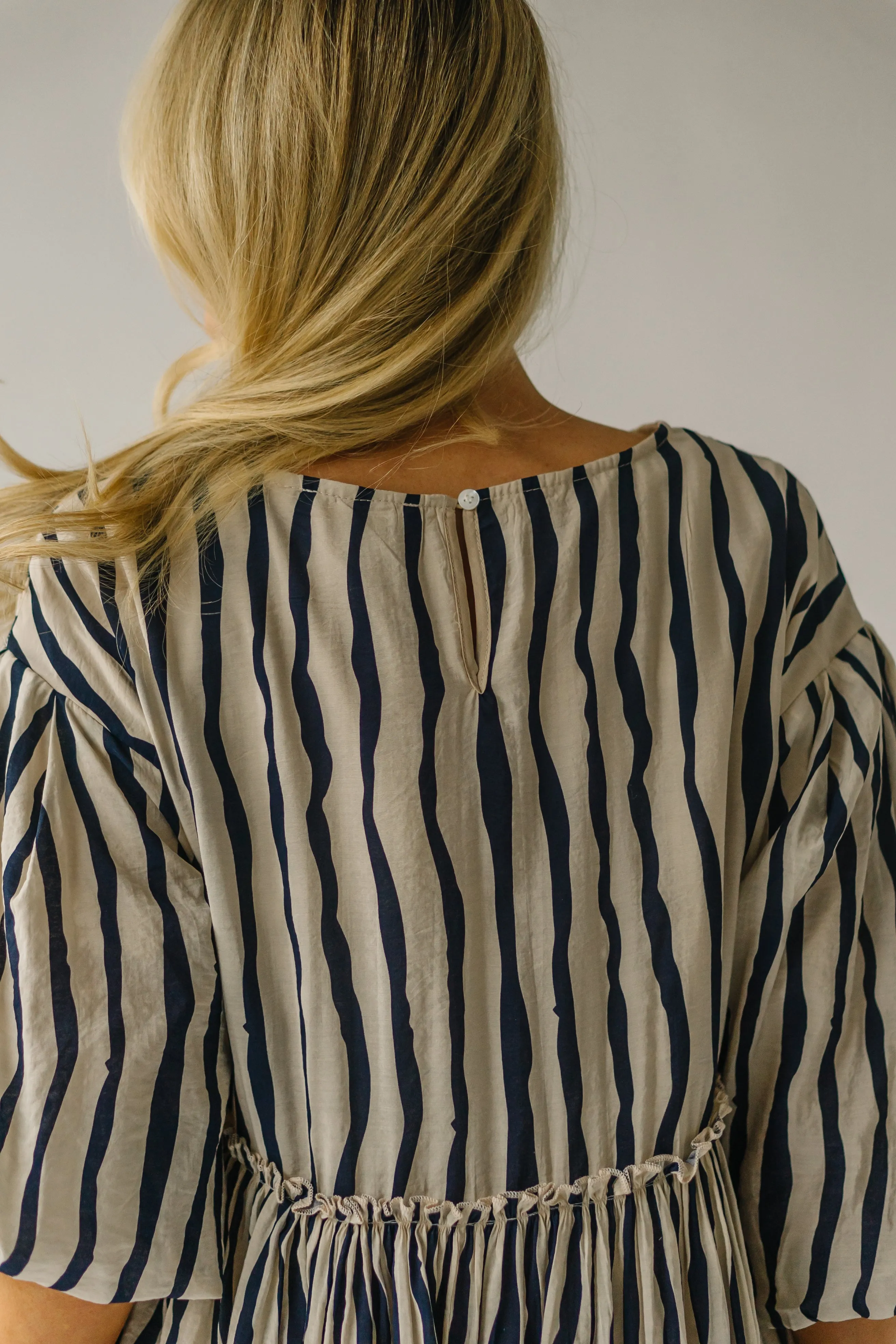 The Pampa Bubble Sleeve Babydoll Dress in Navy Stripe