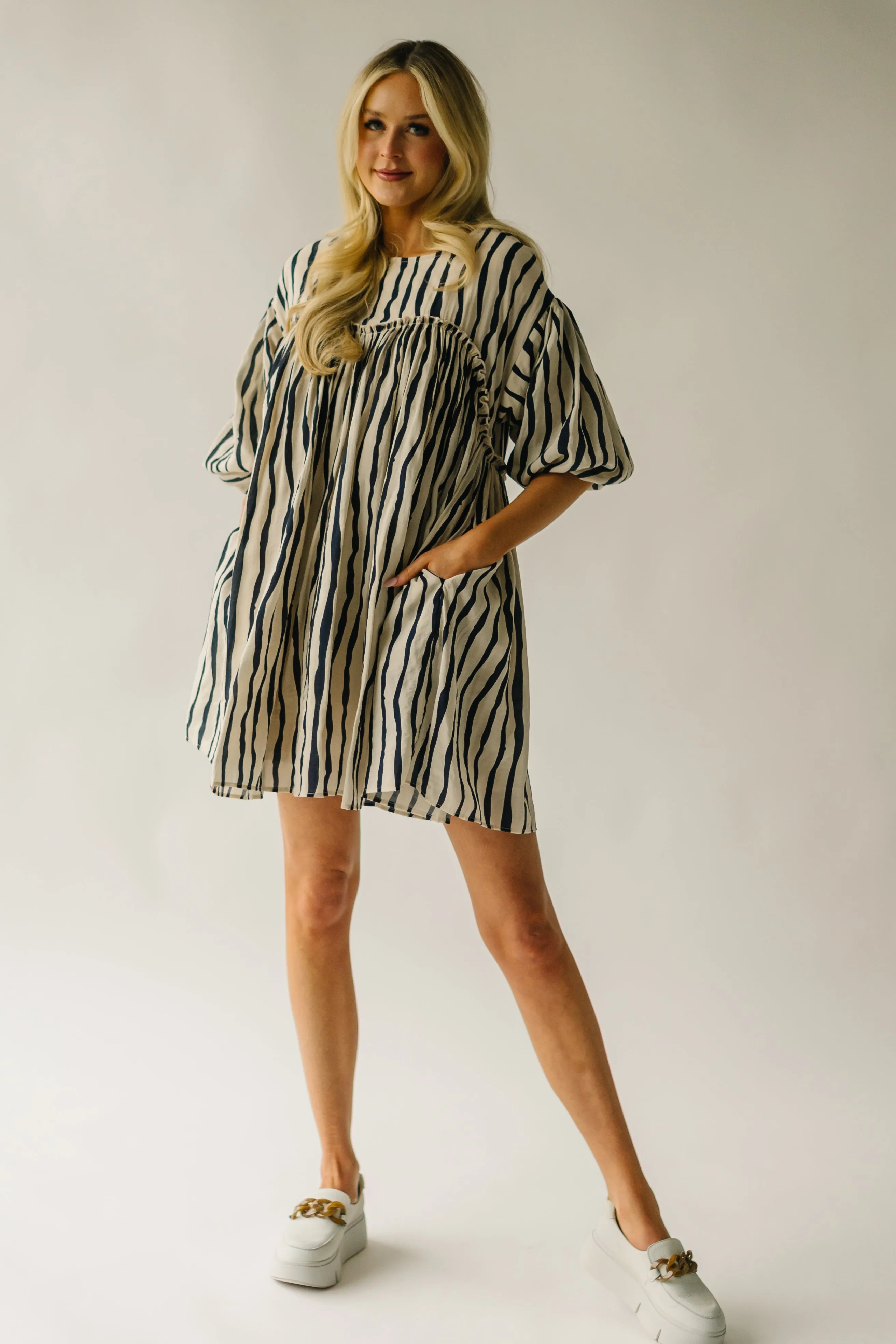 The Pampa Bubble Sleeve Babydoll Dress in Navy Stripe